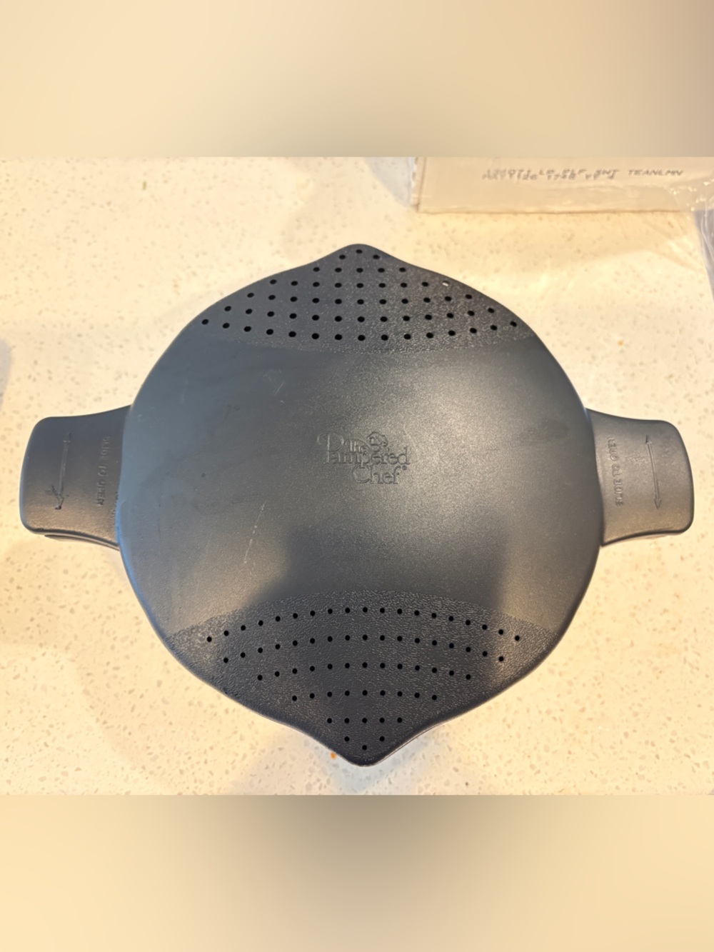 The Pampered Chef Black Silicone Microwave Cooker with Built-In Strainer